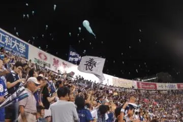 Fans launching the victory balloons into the sky after coming out on top