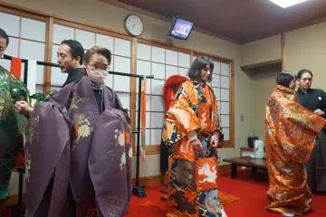 Participants tryng on costumes