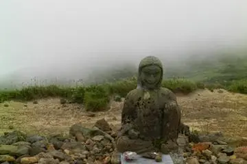 She looks terrifying, but she's there to help mountain walkers.