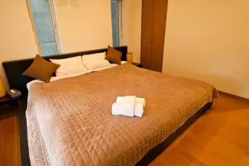 Beautiful king size bed in the three bedroom unit