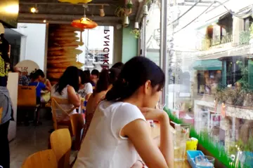 <p>People Watching from the Floor to Ceiling Windows at Pancake Days</p>