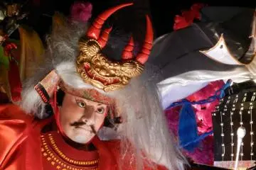 The costumes worn by the characters on the float were very ornate.