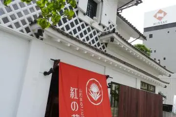 First stop! Beninokura, the old safflower trading house with its distinctive red awning.