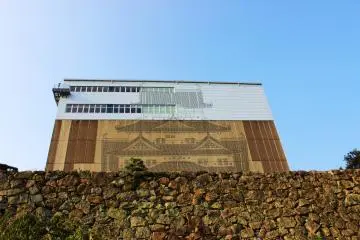 The castle is no longer visible from the castle park, as a temporary building has been built around it. They do, however, have an image of the castle on the outside wall to give you an idea of what lies inside