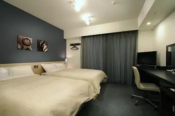 Twin Room (Photo: <a href="http://www.hotel-vista.jp/kumamoto-ap/img/p_room_twin_l.jpg" target="_blank" rel="noreferrer noopener nofollow">Hotel Vista Kumamoto Airport</a>)