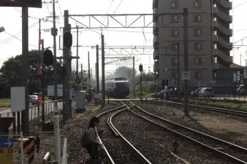 The Aso Boy leaving the station