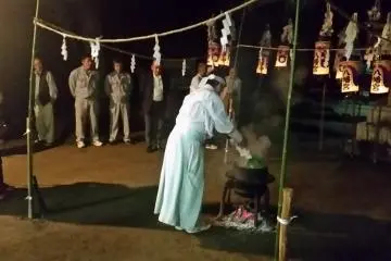 Shinto Priest performing a harvest ritual