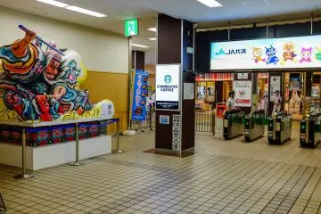 The station is decorated with miniature Nebuta floats