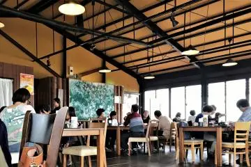 Like a Thai longhouse, the wooden beams are ideal to circulate the tropical sea breezes