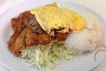 <p>Like a military chow hall, the food at Highway Drive In is stacked high on to the plate</p>