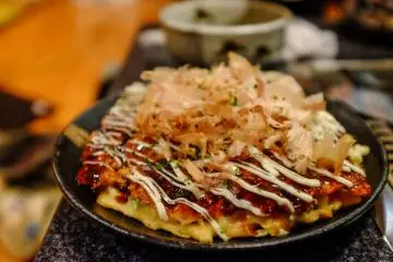 Jyuzo also specialises in okonomiyaki, the chefs prepare it on a giant hotplate right before your eyes