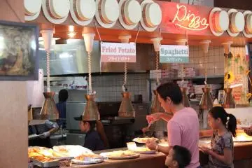 The buffet includes drinks, curry rice, soup. deserts, pizza, pasta, and fried potatoes, but salad is not included other than salad pizza