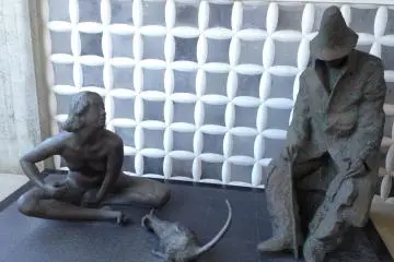 One of the sculptures posed outdoors