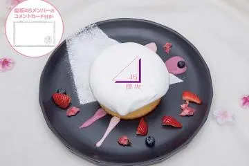 Pancakes that are served with the group's logo on top