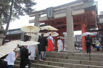 A wedding procession entering the central courtyard
