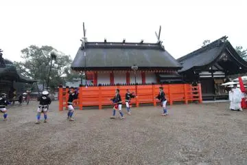 Peforming a Tomoyakko as part of a wedding procession