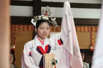 A Miko (Shrine Maiden) performing a dance 