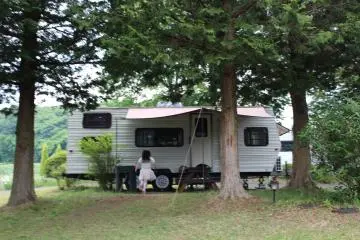 There are several different accommodation choices. We stayed in an old camper van.