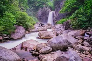Nearby Naena Falls in summer - the road is closed in winter but visitors can snowshoe all the way to the falls which looks amazing in the snow