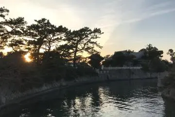 Morito Shrine viewed from Misogi Bridge under a relaxing sunset