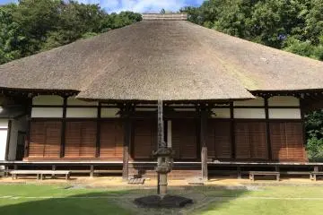 The temple's main hall is known for its thatched roof