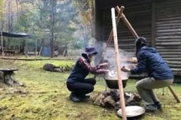 Eating a stew in the forest, cooked over wood fire, tastes so good.