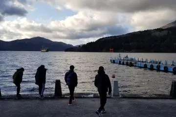 View of Lake Ashi and the tori at Hakone Shrine. Mount Fuji was hiding behind the clouds