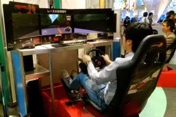 <p>This racing simulator booth gave out personalized certificates when you reached the goal on the game.</p>