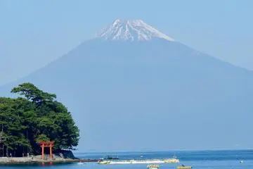 On clear days the Heda torii is dwarfed by Mount Fuji in the background