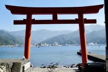 A seaside shrine used by fishermen you can wander directly into the clear water for a swim in Heda Habour