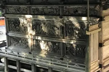 Elaborate wood carvings try to tell a story.