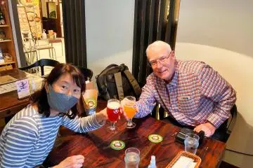 Rey and Miwa enjoying a Nest Beer at Mito Station