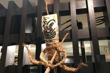 Another common sight: straw statue for a rain-making ritual. 
