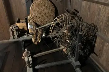 This looks like a device for spinning wool. 