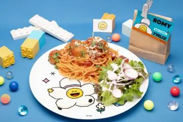 The event includes a variety of main dishes, such as spaghetti and meatballs