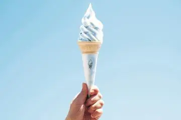 Treat yourself to a blue soft cream once you cross the suspension bridge