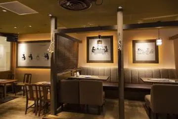 The cafe has various Pingu illustrations on the walls