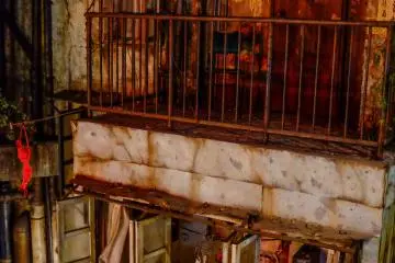 Going up to the first floor, two stories of the walled city’s facade have been recreated