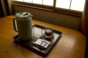Each morning and night you get a complimentary Thermos flask filled with ice cold Mugicha (barley tea) placed in your room. In the mornings you also get a small Bunraku themed biscuit too