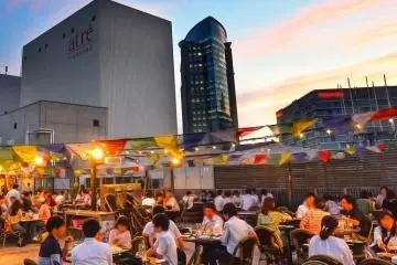 The open rooftop has a covered area, meaning that even in the event of rain patrons can enjoy their meal