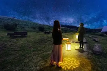 Lantern-guided walks allow visitors to appreciate Aso's nature up close (Public Domain)