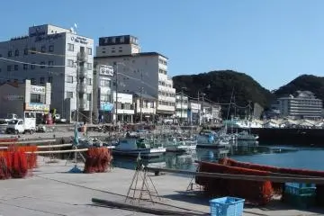 Large resort hotels share the space with fishermen's daily activities