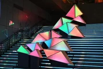 When viewed from a certain angle, these somewhat haphazardly arranged prisms all come together to form one giant prism
