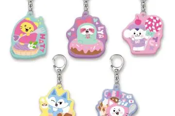 The merchandise on offer includes key chains, tote bags, badges, and more