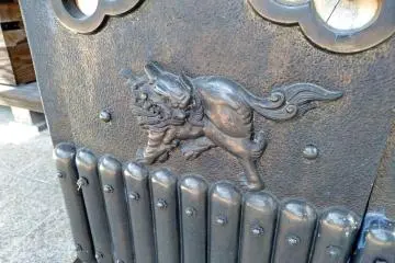 A mythical kirin decorates a column of the main temple