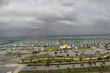 <p>The Ginowan City Marina and the China Sea can be seen across the Route 58 bypass from Round 1</p>