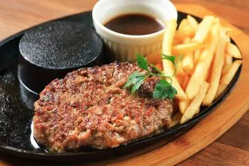 Start with the thick and juicy hamburger patties with a light and airy texture that crumbles away as you cut it, with a mild taste tempered by nutmeg.