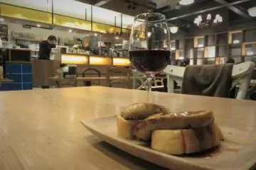 Foie Gras dressed with a decadent sauce on toast.