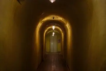 Walk through this eery tunnel to enter your room.