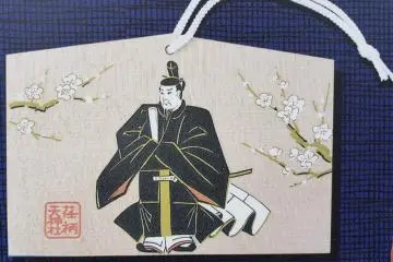 Prayer plaque featuring Michizane with plum blossoms